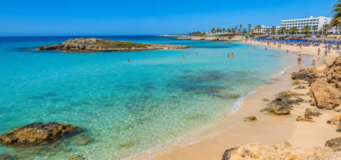 Crystal-clear waters and golden sand at one of the beautiful beaches of Ayia Napa, Cyprus